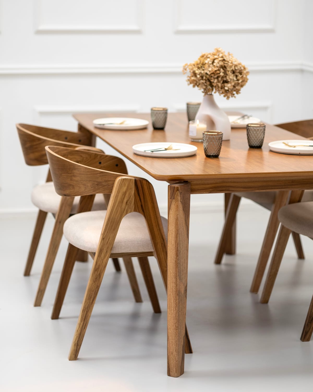 Bright dining room with a set wooden table